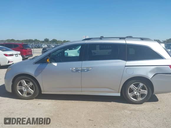 2012 Honda Odyssey Touring с VIN 5FNRL5H95CB122101, выставлен на аукционе IAAI как лот 43489117 с пробегом 154 148 миль миль и . История ставок и продаж доступна на DreamBid. Изображение 14.