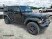 2024 Jeep Wrangler Sport S with VIN 1C4PJXDNXRW349946, listed as a Copart auction lot 56701185 with 6,310 mi miles and Salvage title. Bid and sale history available at DreamBid. Image 4.