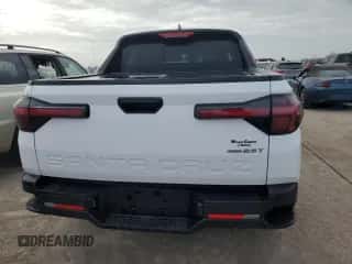 2022 Hyundai Santa Cruz SEL Premium с VIN 5NTJDDAF5NH038693, выставлен на аукционе Copart как лот 74946504 с пробегом 17 214 миль миль и На запчасти • Non repairable. История ставок и продаж доступна на DreamBid. Изображение 6.