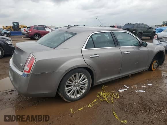 2014 Chrysler 300 C with VIN 2C3CCAKG1EH200994, listed as a Copart auction lot 85164505 with 182,228 mi miles and Salvage title. Bid and sale history available at DreamBid. Image 3.
