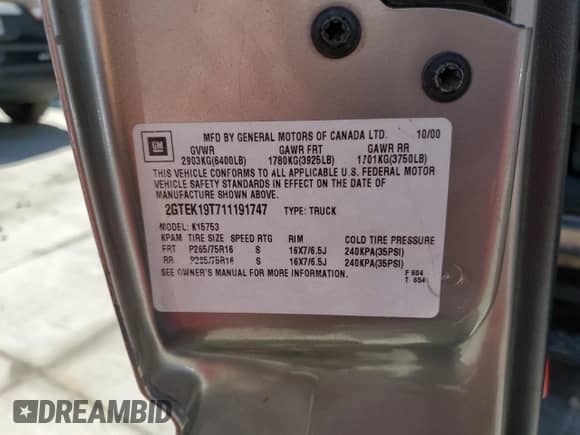 2001 GMC Sierra 1500 SLE с VIN 2GTEK19T711191747, выставлен на аукционе Copart как лот 69829495 с пробегом Не указан миль и Списание • Salvage title. История ставок и продаж доступна на DreamBid. Изображение 12.