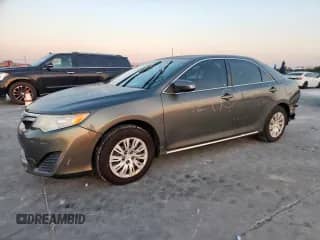 2014 Toyota Camry XLE with VIN 4T4BF1FK1ER378948, listed as a Copart auction lot 85004115 with 151,585 mi miles and Salvage title. Bid and sale history available at DreamBid. Image 1.