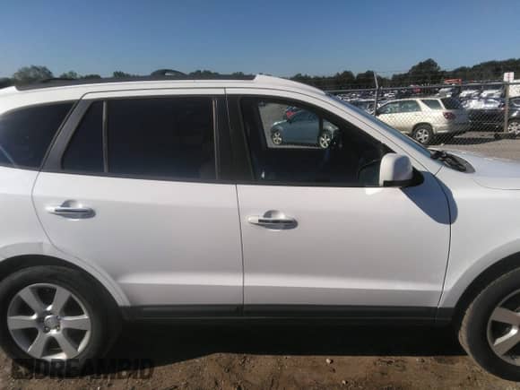 2007 Hyundai Santa Fe SE z VIN 5NMSH73E37H066098, wystawiony jako IAAI lot #43111802 z przebiegiem 167 222 mil mil oraz . Historia ofert i sprzedaży dostępna na DreamBid. Obrazek 13.