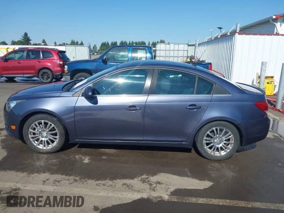2014 Chevrolet Cruze ECO z VIN 1G1PH5SB4E7223068, wystawiony jako IAAI lot #42677177 z przebiegiem 91 199 mil mil oraz . Historia ofert i sprzedaży dostępna na DreamBid. Obrazek 14.