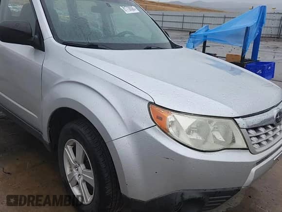 2011 Subaru Forester X z VIN JF2SHBBC9BG723345, wystawiony jako Copart lot #81730085 z przebiegiem 173 477 mil mil oraz Szkoda całkowita • Salvage title. Historia ofert i sprzedaży dostępna na DreamBid. Obrazek 14.