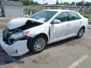 2012 Toyota Camry L z VIN 4T1BF1FKXCU545704, wystawiony jako IAAI lot #42434260 z przebiegiem 143 572 mil mil oraz . Historia ofert i sprzedaży dostępna na DreamBid. Obrazek 2.