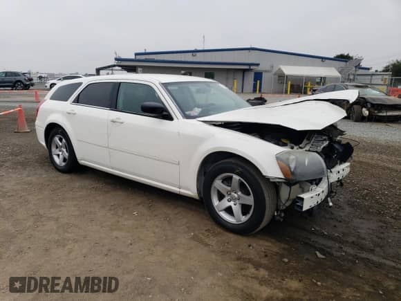2007 Dodge Magnum with VIN 2D4FV47V57H623322, listed as a Copart auction lot 73356244 with 200,976 mi miles and Salvage title. Bid and sale history available at DreamBid. Image 4.