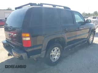 2002 Chevrolet Tahoe Z71 with VIN 1GNEK13ZX2R275185, listed as a IAAI auction lot 43412229 with 235,789 mi miles and . Bid and sale history available at DreamBid. Image 4.