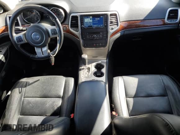 2012 Jeep Grand Cherokee Limited z VIN 1C4RJFBG3CC315296, wystawiony jako Copart lot #86295685 z przebiegiem 80 637 mil mil oraz Szkoda całkowita • Salvage title. Historia ofert i sprzedaży dostępna na DreamBid. Obrazek 8.