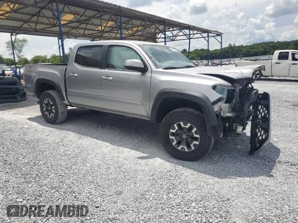 2020 Toyota Tacoma SR5 с VIN 5TFAZ5CN1LX090978, выставлен на аукционе Copart как лот 64010265 с пробегом 117 433 миль миль и Списание • Salvage title. История ставок и продаж доступна на DreamBid. Изображение 4.