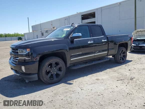 2017 Chevrolet Silverado 1500 LTZ with VIN 1GCVKSEC5HZ149848, listed as a Copart auction lot 54541825 with 104,291 mi miles and Salvage title. Bid and sale history available at DreamBid. Image 1.