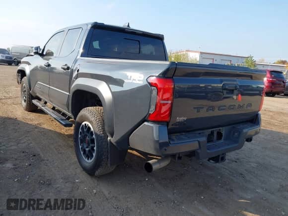 2024 Toyota Tacoma SR5 with VIN 3TYLB5JN7RT001210, listed as a IAAI auction lot 43255026 with 16,983 mi miles and . Bid and sale history available at DreamBid. Image 3.