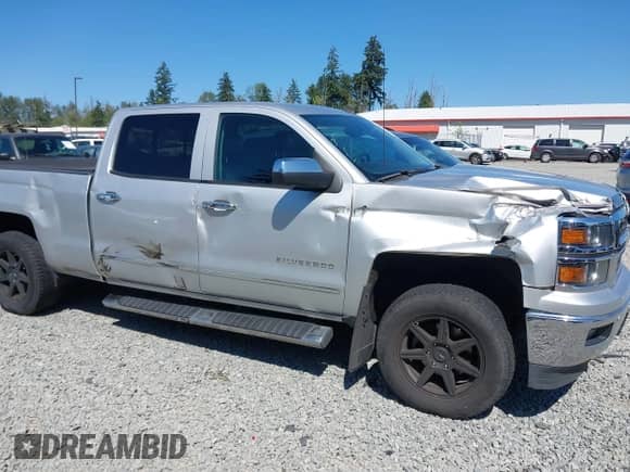 2014 Chevrolet Silverado 1500 LTZ with VIN 1GCUKSEC4EF197043, listed as a IAAI auction lot 42673341 with 131,445 mi miles and . Bid and sale history available at DreamBid. Image 6.