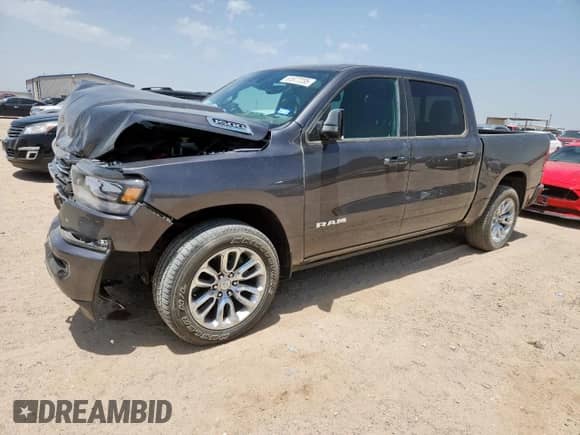 2023 Ram 1500 Laramie z VIN 1C6RREJT4PN603962, wystawiony jako Copart lot #61877235 z przebiegiem 18 705 mil mil oraz Szkoda całkowita • Salvage title. Historia ofert i sprzedaży dostępna na DreamBid. Obrazek 1.