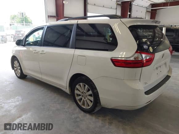 2017 Toyota Sienna LE with VIN 5TDJZ3DC4HS180642, listed as a IAAI auction lot 42517719 with 197,983 mi miles and . Bid and sale history available at DreamBid. Image 3.