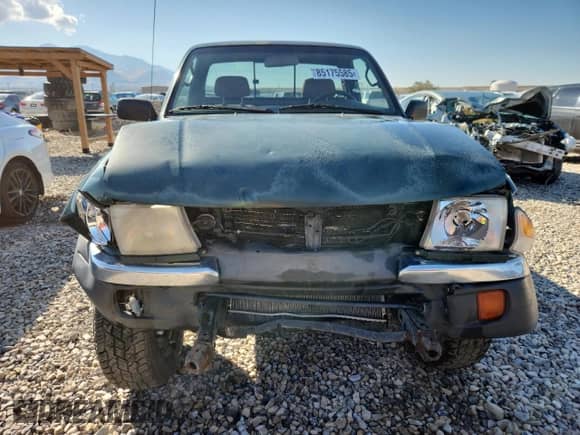 1999 Toyota Tacoma z VIN 4TAPM62N8XZ457865, wystawiony jako Copart lot #85175585 z przebiegiem 222 153 mil mil oraz Szkoda całkowita • Salvage title. Historia ofert i sprzedaży dostępna na DreamBid. Obrazek 5.
