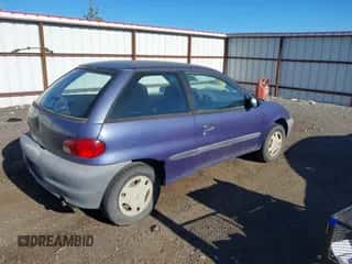 1999 Chevrolet Metro z VIN 2C1MR2264X6708688, wystawiony jako IAAI lot #42827116 z przebiegiem 230 118 mil mil oraz . Historia ofert i sprzedaży dostępna na DreamBid. Obrazek 4.