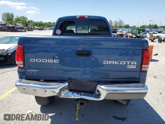 2004 Dodge Dakota SLT z VIN 1D7HG48N24S563945, wystawiony jako Copart lot #55990595 z przebiegiem 169 684 mil mil oraz Szkoda całkowita • Salvage title. Historia ofert i sprzedaży dostępna na DreamBid. Obrazek 6.