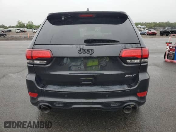 2016 Jeep Grand Cherokee SRT z VIN 1C4RJFDJXGC343157, wystawiony jako Copart lot #59521275 z przebiegiem Nie podano mil oraz Szkoda całkowita • Salvage title. Historia ofert i sprzedaży dostępna na DreamBid. Obrazek 6.