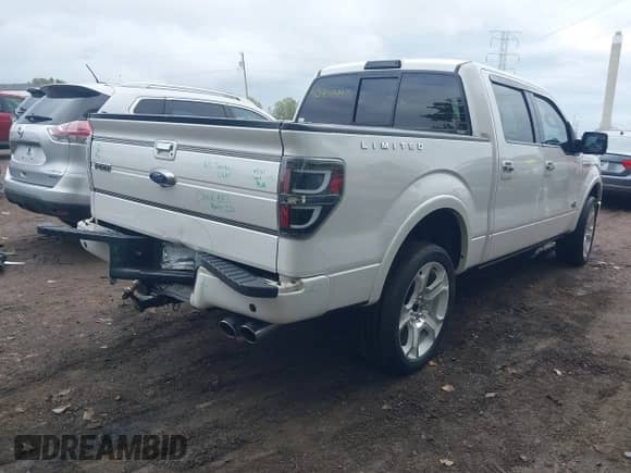 2011 Ford F-150 Lariat with VIN 1FTFW1E62BFA49969, listed as a IAAI auction lot 43404490 with 176,682 mi miles and . Bid and sale history available at DreamBid. Image 4.