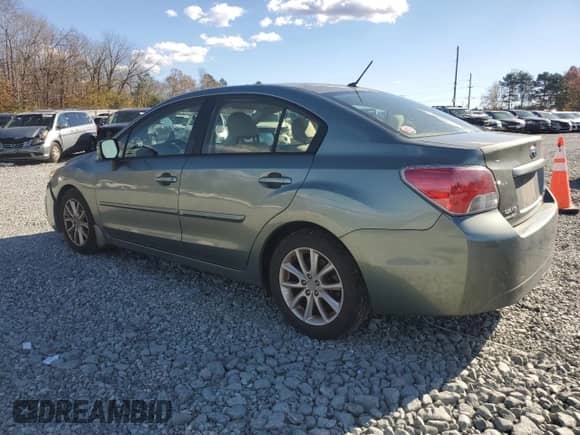 2014 Subaru Impreza Premium с VIN JF1GJAC67EG017268, выставлен на аукционе Copart как лот 80907364 с пробегом 160 132 миль миль и Списание • Salvage title. История ставок и продаж доступна на DreamBid. Изображение 2.