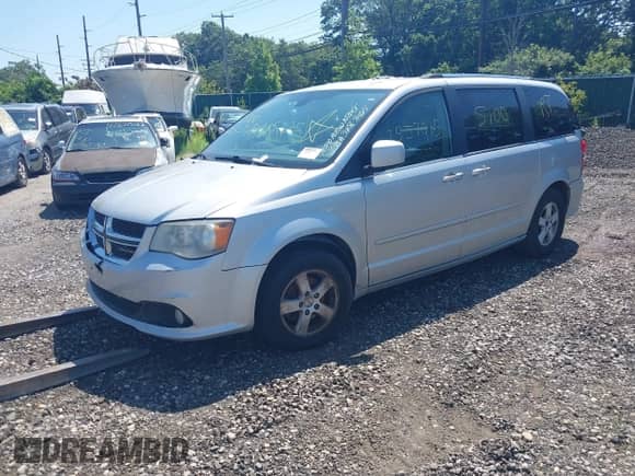 2011 Dodge Grand Caravan Crew with VIN 2D4RN5DGXBR657364, listed as a IAAI auction lot 42952703 with Not provided miles and . Bid and sale history available at DreamBid. Image 2.