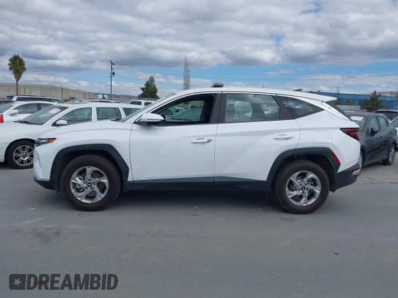 2022 Hyundai Tucson SE with VIN 5NMJACAE0NH058470, listed as a IAAI auction lot 43383370 with 89,596 mi miles and . Bid and sale history available at DreamBid. Image 14.