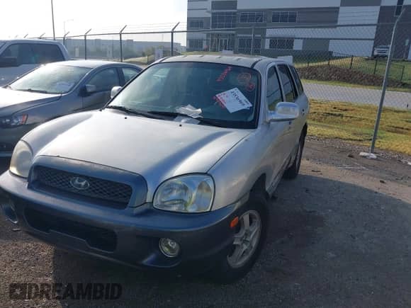 2003 Hyundai Santa Fe GLS z VIN KM8SC13D73U373131, wystawiony jako IAAI lot #43536969 z przebiegiem 270 848 mil mil oraz . Historia ofert i sprzedaży dostępna na DreamBid. Obrazek 2.