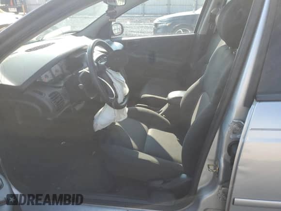 2004 Dodge Neon SXT with VIN 1B3ES56C94D560985, listed as a Copart auction lot 71305465 with 44,077 mi miles and Salvage title. Bid and sale history available at DreamBid. Image 7.
