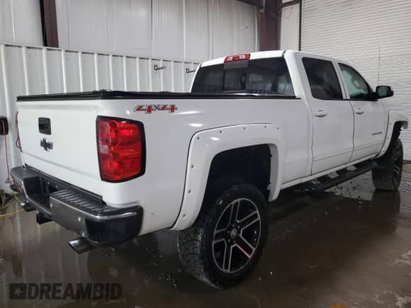 2015 Chevrolet Silverado 1500 LT with VIN 1GCUKREC3FF203716, listed as a Copart auction lot 62157815 with 50,014 mi miles and Salvage title. Bid and sale history available at DreamBid. Image 3.