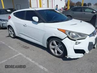 2014 Hyundai Veloster с VIN KMHTC6AD8EU209409, выставлен на аукционе IAAI как лот 42087236 с пробегом 124 459 миль миль и . История ставок и продаж доступна на DreamBid. Изображение 1.