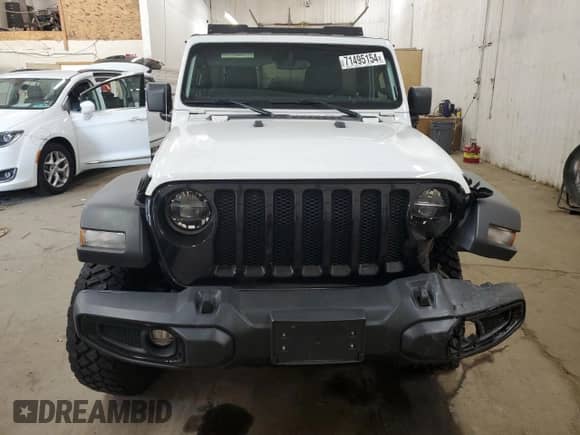2022 Jeep Wrangler Unlimited Willys z VIN 1C4HJXDM0NW244953, wystawiony jako Copart lot #71495154 z przebiegiem 14 577 mil mil oraz Szkoda całkowita • Salvage title. Historia ofert i sprzedaży dostępna na DreamBid. Obrazek 5.