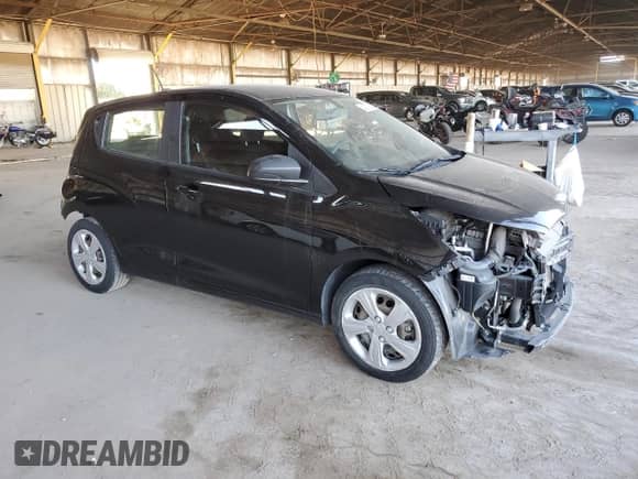 2019 Chevrolet Spark LS with VIN KL8CB6SAXKC815512, listed as a Copart auction lot 84271055 with 70,909 mi miles and Salvage title. Bid and sale history available at DreamBid. Image 4.