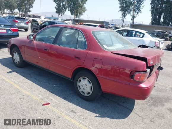 1994 Toyota Camry LE z VIN 4T1SK12E3RU361550, wystawiony jako IAAI lot #42975482 z przebiegiem 182 006 mil mil oraz . Historia ofert i sprzedaży dostępna na DreamBid. Obrazek 3.