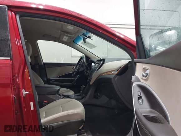 2016 Hyundai Santa Fe with VIN 5XYZTDLB8GG369566, listed as a IAAI auction lot 42633397 with 165,837 mi miles and . Bid and sale history available at DreamBid. Image 5.