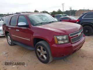 2009 Chevrolet Tahoe LTZ z VIN 1GNFK33049R132583, wystawiony jako IAAI lot #43167001 z przebiegiem 266 629 mil mil oraz . Historia ofert i sprzedaży dostępna na DreamBid. Obrazek 1.