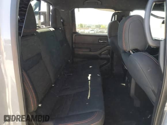 2023 Nissan Frontier Pro-4X with VIN 1N6ED1EK6PN631338, listed as a Copart auction lot 66752625 with 11,519 mi miles and Salvage title. Bid and sale history available at DreamBid. Image 10.