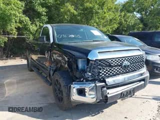 2021 Toyota Tundra SR5 with VIN 5TFEY5F14MX294611, listed as a IAAI auction lot 43149778 with 63,635 mi miles and . Bid and sale history available at DreamBid. Image 1.