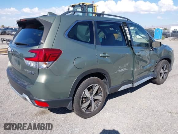 2020 Subaru Forester Touring with VIN JF2SKAXCXLH545932, listed as a IAAI auction lot 43305973 with 50,723 mi miles and . Bid and sale history available at DreamBid. Image 4.
