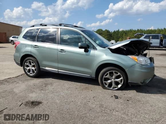 2016 Subaru Forester Touring with VIN JF2SJAXC1GH546735, listed as a Copart auction lot 80818985 with 116,913 mi miles and Salvage title. Bid and sale history available at DreamBid. Image 4.