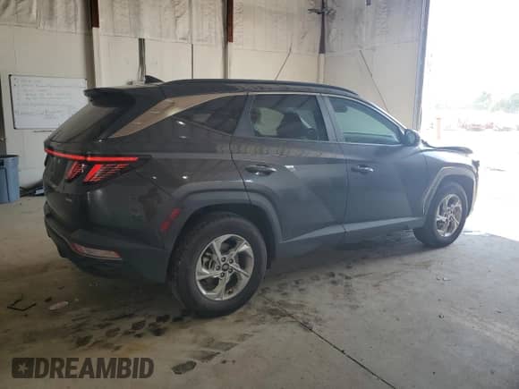 2023 Hyundai Tucson SEL with VIN 5NMJBCAE7PH217341, listed as a Copart auction lot 65925305 with 57,573 mi miles and Salvage title. Bid and sale history available at DreamBid. Image 3.