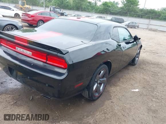 2013 Dodge Challenger SXT with VIN 2C3CDYAG1DH581784, listed as a IAAI auction lot 42263476 with 107,341 mi miles and . Bid and sale history available at DreamBid. Image 4.