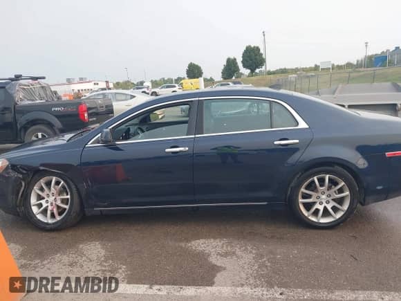 2012 Chevrolet Malibu LTZ 1LZ z VIN 1G1ZE5E08CF264561, wystawiony jako IAAI lot #43153788 z przebiegiem 160 864 mil mil oraz . Historia ofert i sprzedaży dostępna na DreamBid. Obrazek 14.