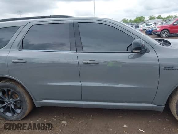 2023 Dodge Durango R/T Plus with VIN 1C4SDJCT1PC582028, listed as a IAAI auction lot 42244917 with 52,276 mi miles and . Bid and sale history available at DreamBid. Image 14.