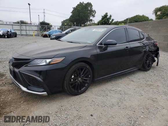 2023 Toyota Camry Hybrid XSE с VIN 4T1K31AK3PU056261, выставлен на аукционе Copart как лот 67843095 с пробегом 20 789 миль миль и Списание • Salvage title. История ставок и продаж доступна на DreamBid. Изображение 1.