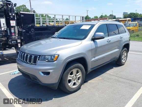 2017 Jeep Grand Cherokee Altitude with VIN 1C4RJFAG5HC954742, listed as a IAAI auction lot 42790453 with 131,370 mi miles and . Bid and sale history available at DreamBid. Image 2.
