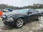 2012 Dodge Charger SXT z VIN 2C3CDXHG1CH272198, wystawiony jako Copart lot #90362075 z przebiegiem 186 070 mil mil oraz Czysty tytuł • Clean title. Historia ofert i sprzedaży dostępna na DreamBid. Obrazek 1.