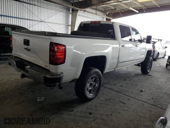2014 Chevrolet Silverado 1500 LTZ z VIN 1GCUKSEC4EF194630, wystawiony jako Copart lot #81909935 z przebiegiem 183 428 mil mil oraz Szkoda całkowita • Salvage title. Historia ofert i sprzedaży dostępna na DreamBid. Obrazek 3.