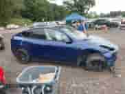 2022 Tesla Model Y Performance z VIN 7SAYGDEF1NF381579, wystawiony jako IAAI lot #42907318 z przebiegiem 78 749 mil mil oraz . Historia ofert i sprzedaży dostępna na DreamBid. Obrazek 12.
