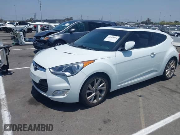 2012 Hyundai Veloster w/Black Int с VIN KMHTC6AD5CU056209, выставлен на аукционе IAAI как лот 42565571 с пробегом 137 908 миль миль и . История ставок и продаж доступна на DreamBid. Изображение 2.